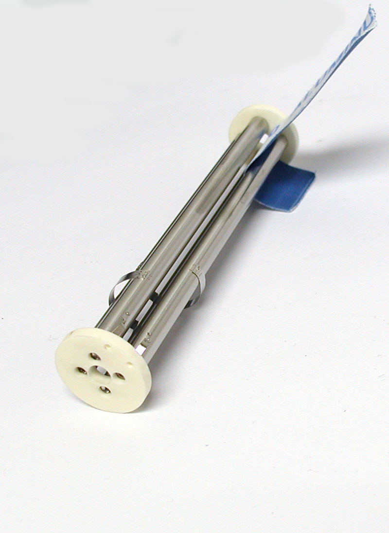 Polishing the quadrupole rods with abrasive paper